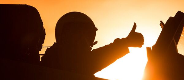 Piloto de las Fuerzas Aeroespaciales de Rusia durante la operación contra el EI en Siria Piloto de las Fuerzas Aeroespaciales de Rusia durante la operación contra el EI en Siria - Sputnik Mundo