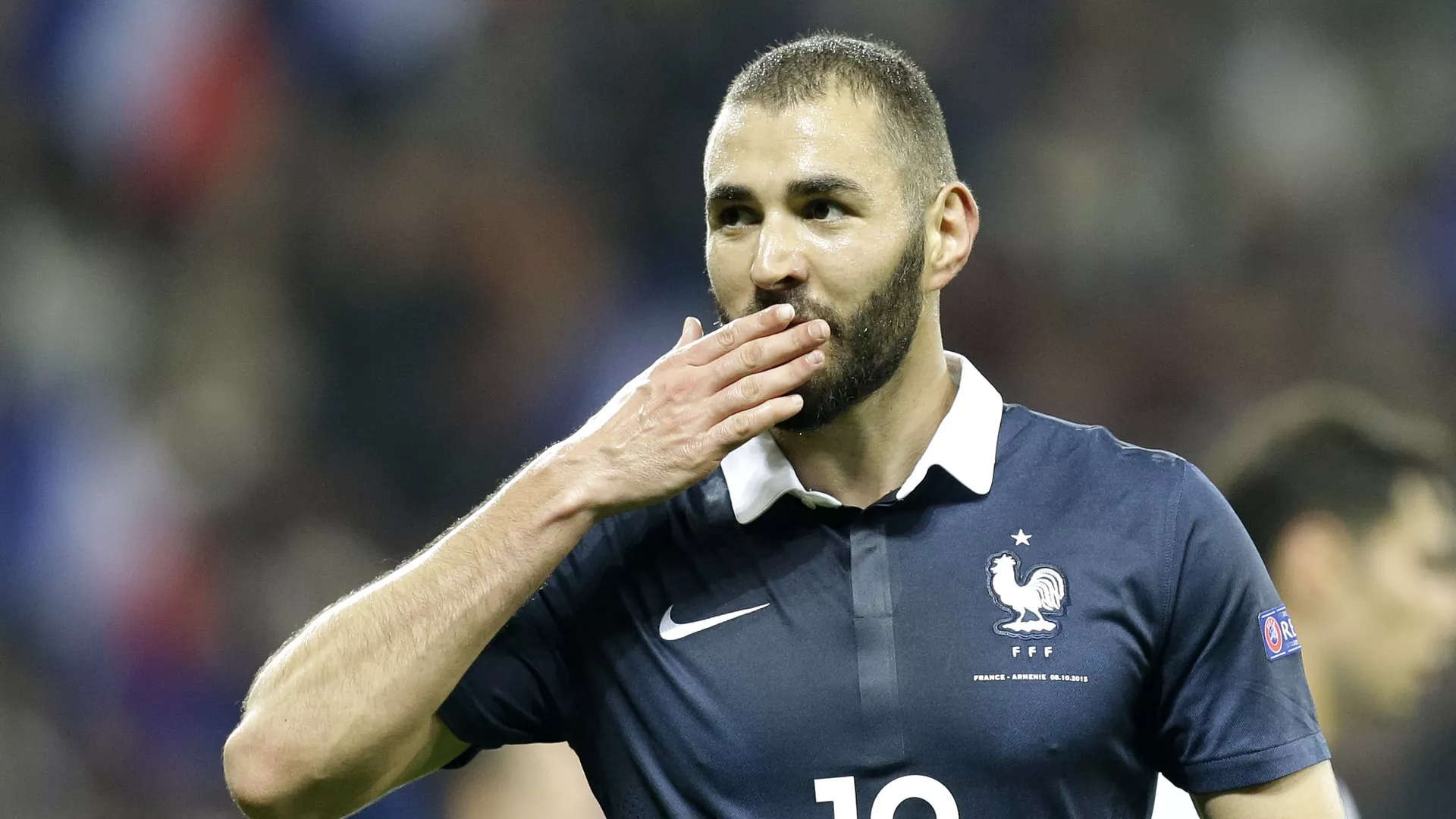 France's Karim Benzema reacts after scoring the fourth goal against Armenia during their friendly soccer match in the stadium of Nice, southeastern France, Thursday, Oct 8, 2015. 
