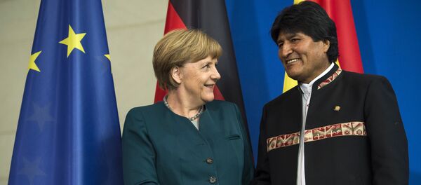 La canciller de Alemania, Angela Merkel, y el presidente de Bolivia, Evo Morales - Sputnik Mundo