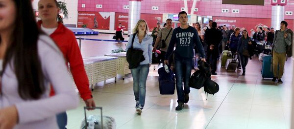 Turistas rusos en el aeropuerto de Sharm el Sheikh - Sputnik Mundo