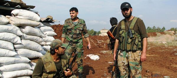 Soldados de ejército sirio en la provincia de Daraa - Sputnik Mundo