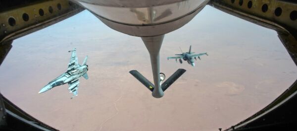 Fuerzas aéreas canadienses y estadounidenses en la operación contra el EI en Irak - Sputnik Mundo