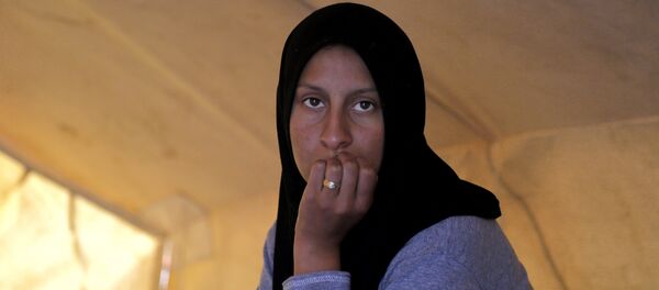 Una refugiada en un campo para migrantes en Chipre - Sputnik Mundo