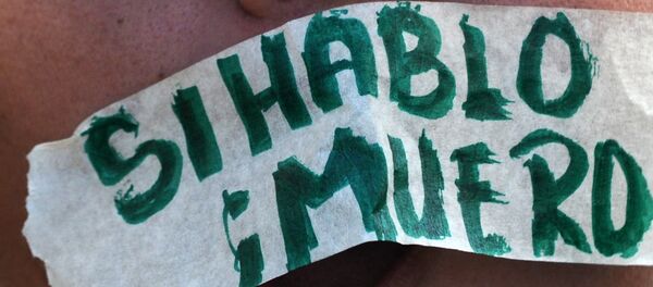 Periodista hondureña participa en una manifestación exigiendo la justicia en el caso de asesinato de periodista Alfredo Villatoro (Archivo) - Sputnik Mundo