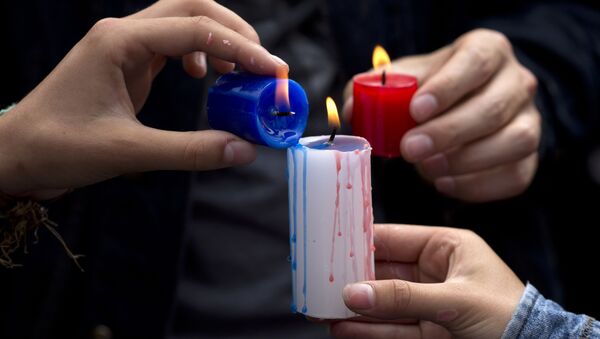 El mundo expresa su dolor por las víctimas de los atentados en París - Sputnik Mundo