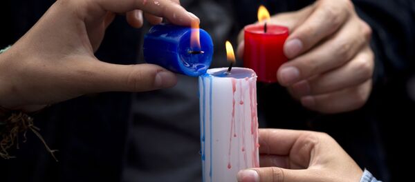 El mundo expresa su dolor por las víctimas de los atentados en París - Sputnik Mundo