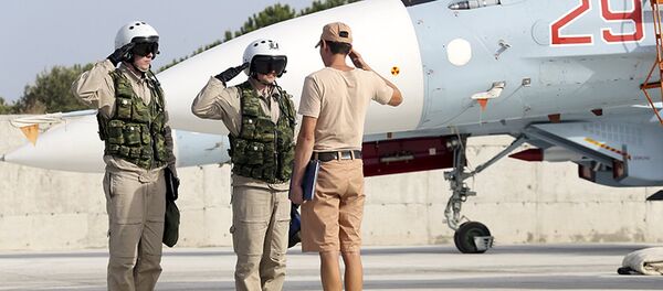 Pilotos rusos en la base aérea siria de Hmeymim Pilotos rusos en la base aérea siria de Hmeymim - Sputnik Mundo