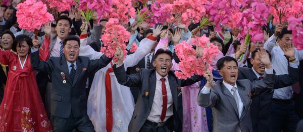 Norcoreanos festejan el 70 aniversario del Partido de los Trabajadores. 10 de octubre de 2015 - Sputnik Mundo