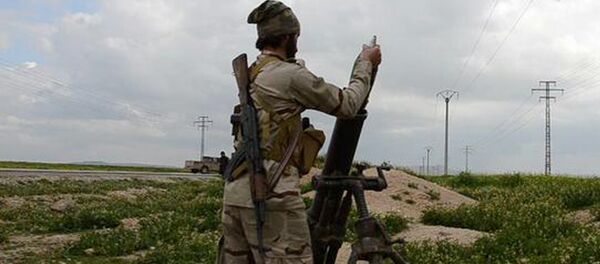 Un militante del grupo yihadista Daesh (archivo) - Sputnik Mundo