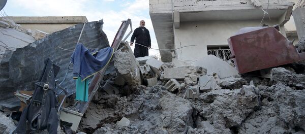 Edificios destruidos en Siria Edificios destruidos en Siria - Sputnik Mundo