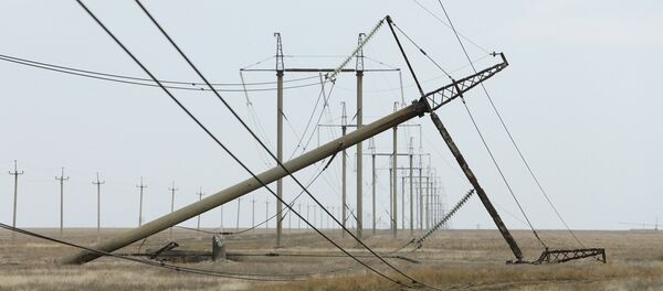 Torre de eléctrica dañada en la región de Jersón, cerca la frontera con Crimea - Sputnik Mundo