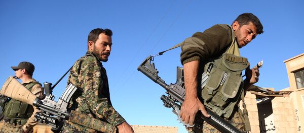 Fighters from the Syrian Democratic Forces (SDF) coalition - Sputnik Mundo