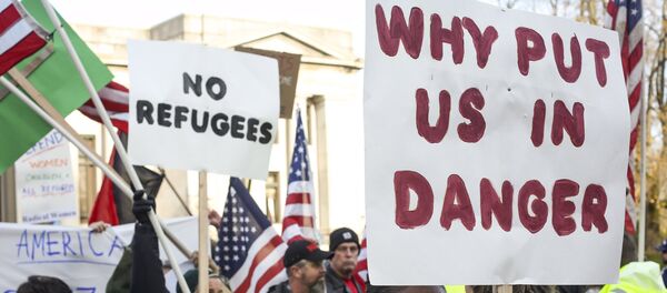 Protesta contra los refugiados en los EEUU - Sputnik Mundo