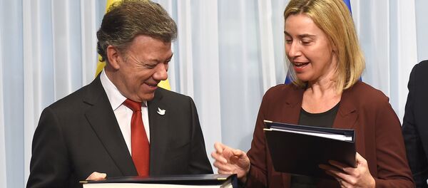 Presidente de Colombia, Juan Manuel Santos, y  alta representante para Asuntos Exteriores de UE, Federica Mogherini - Sputnik Mundo