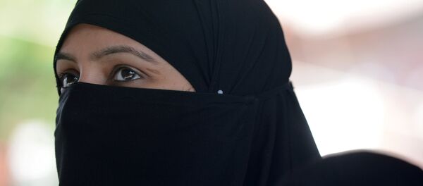 Una mujer musulmana - Sputnik Mundo