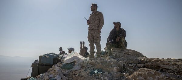 Combatientes de la milicia popular siria cerca de Palmira - Sputnik Mundo