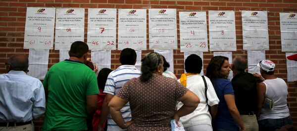 Oposición gana 99 escaños contra 46 del oficialismo en Venezuela Oposición gana 99 escaños contra 46 del oficialismo en Venezuela - Sputnik Mundo