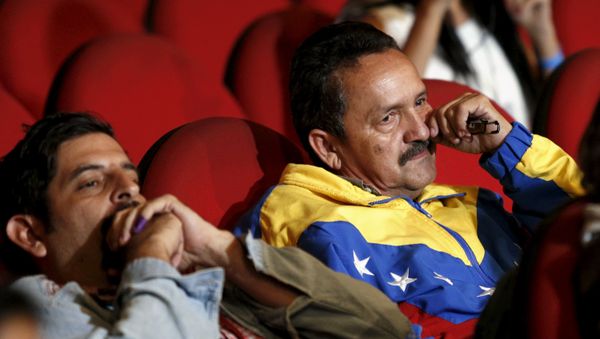 Partidarios de Nicolás Maduro durante las elecciones en Venezuela Partidarios de Nicolás Maduro durante las elecciones en Venezuela - Sputnik Mundo