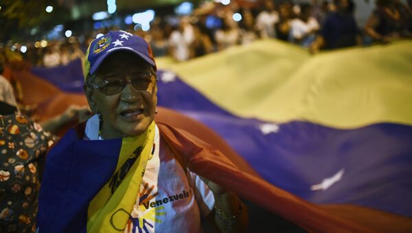 Partidario de la oposición venezolana - Sputnik Mundo