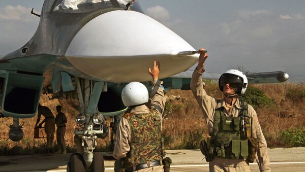 Pilotos rusos en la base aérea siria de Hmeymim - Sputnik Mundo