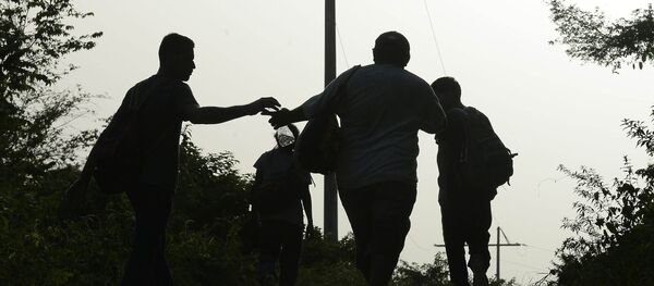 Inmigrantes ilegales en México - Sputnik Mundo