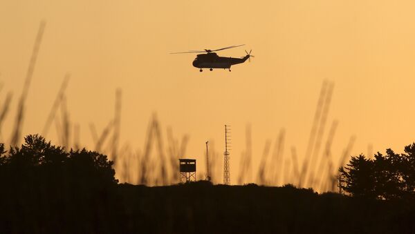 Un helicóptero - Sputnik Mundo