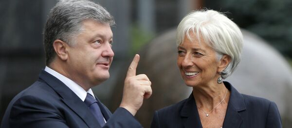 Presidente de Ucrania, Petró Poroshenko y directora del FMI, Christine Lagarde - Sputnik Mundo