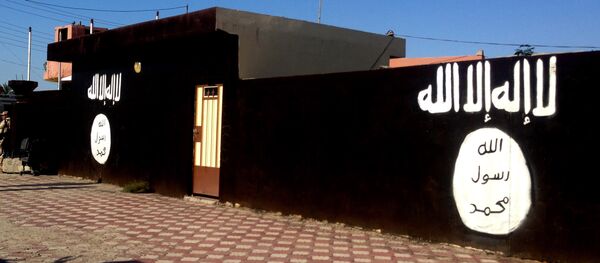 Bandera del Daesh - Sputnik Mundo