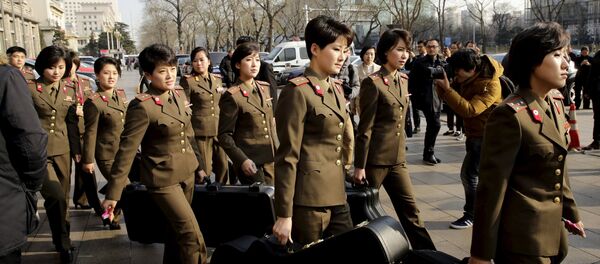 Las miembros del grupo norcoreano Moranbong en Pekín Las miembros del grupo norcoreano Moranbong en Pekín - Sputnik Mundo