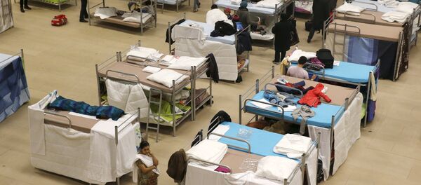 Refugiados en una escuela de Berlín, Alemania (archivo) - Sputnik Mundo