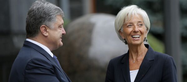 Presidente de Ucrania, Petró Poroshenko y directora del FMI, Christine Lagarde - Sputnik Mundo