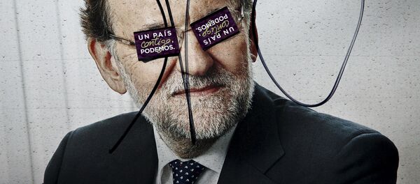 Un cartel electoral con la imagen de Mariano Rajoy en Madrid - Sputnik Mundo