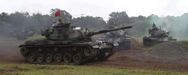Soldados taiwaneses conducen carros de combate estadounidenses M60-A3 durante unas manobras (Archivo) - Sputnik Mundo