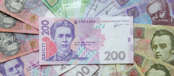 Billetes de grivna ucraniana - Sputnik Mundo