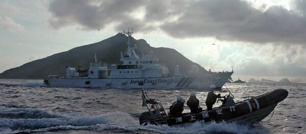 Guarda costas de Japón cerca de las islas Senkaku (Diaoyu) (archivo) - Sputnik Mundo