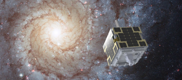 Un satélite de la compañía Dauria Aerospace en el espacio - Sputnik Mundo