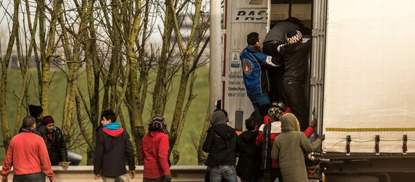 Migrantes y refugiados en el territorio de Francia - Sputnik Mundo