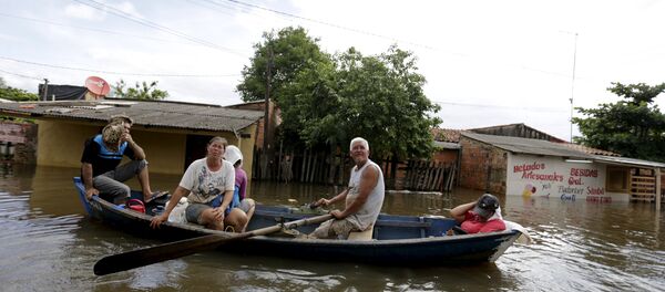 Capital de Paraguay en desastre total por inundaciones - Sputnik Mundo
