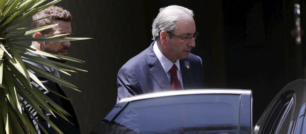 Brazil's Lower House Speaker Eduardo Cunha leaves his home in Brasilia, Brazil, December 15, 2015. Brazil's Lower House Speaker Eduardo Cunha leaves his home in Brasilia, Brazil, December 15, 2015. - Sputnik Mundo