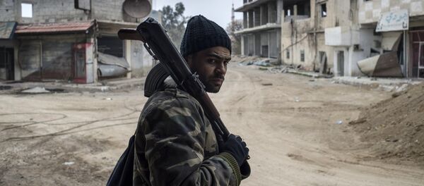 Soldado sirio en Damasco Soldado sirio en Damasco - Sputnik Mundo