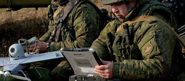 Militares rusos usan un dron Militares rusos usan un dron - Sputnik Mundo