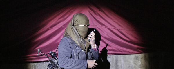 Un miliciano kurdo - Sputnik Mundo