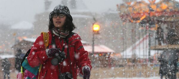 Una turista china - Sputnik Mundo