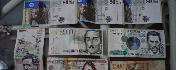 Pesos colombianos Pesos colombianos - Sputnik Mundo