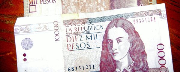 Pesos colombianos - Sputnik Mundo