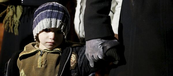 Un niño de la ciudad sitiada Madaya Un niño de la ciudad sitiada Madaya - Sputnik Mundo
