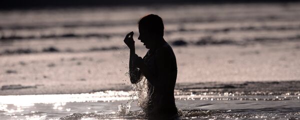 Baño de la Epifanía - Sputnik Mundo