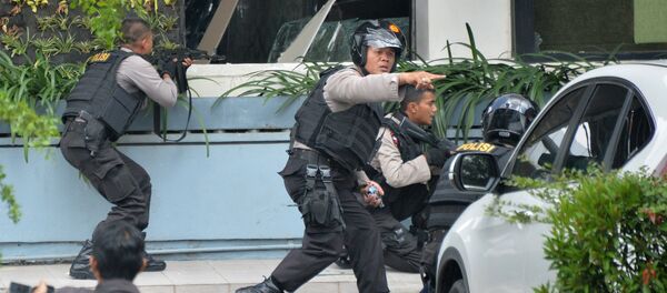 La policía en Indonesia - Sputnik Mundo