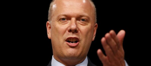 Chris Grayling, ministro británico de Transporte - Sputnik Mundo