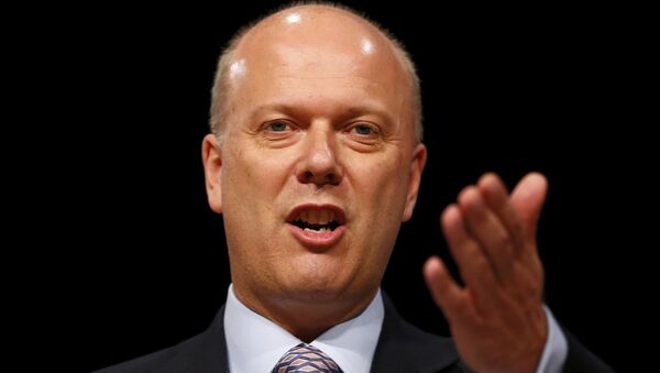 Chris Grayling, ministro británico de Transporte - Sputnik Mundo